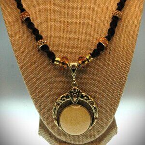 Luxurious Gold Toned Crescent Moon on a Handmade Black 22 1/4" Chain
